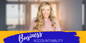 Shanda wearing pink sweater, business accountability over image